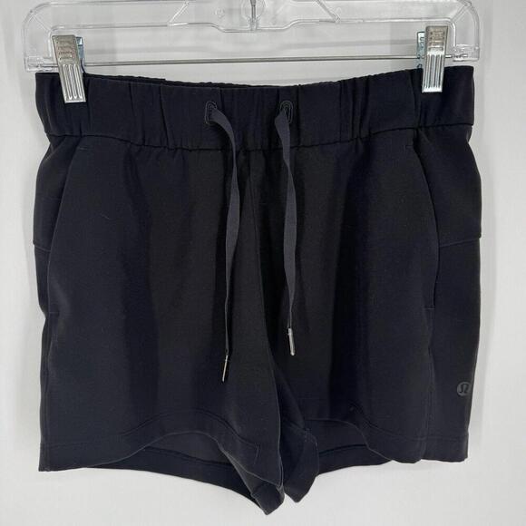 Lululemon Shorts Women’s 4 black on the fly woven drawstring athletic athleisure - Picture 1 of 7
